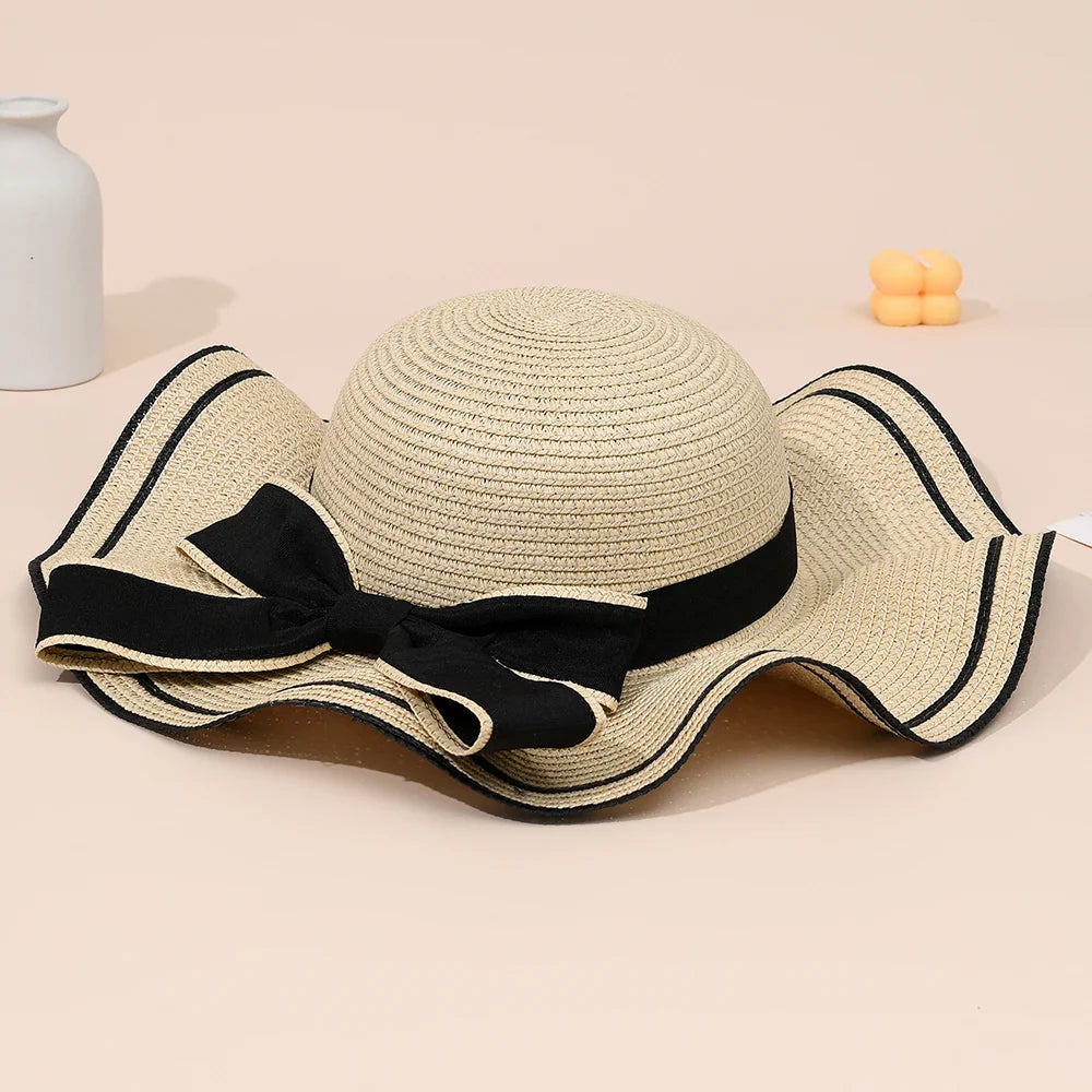 Sola - Bow Tied Straw Hat